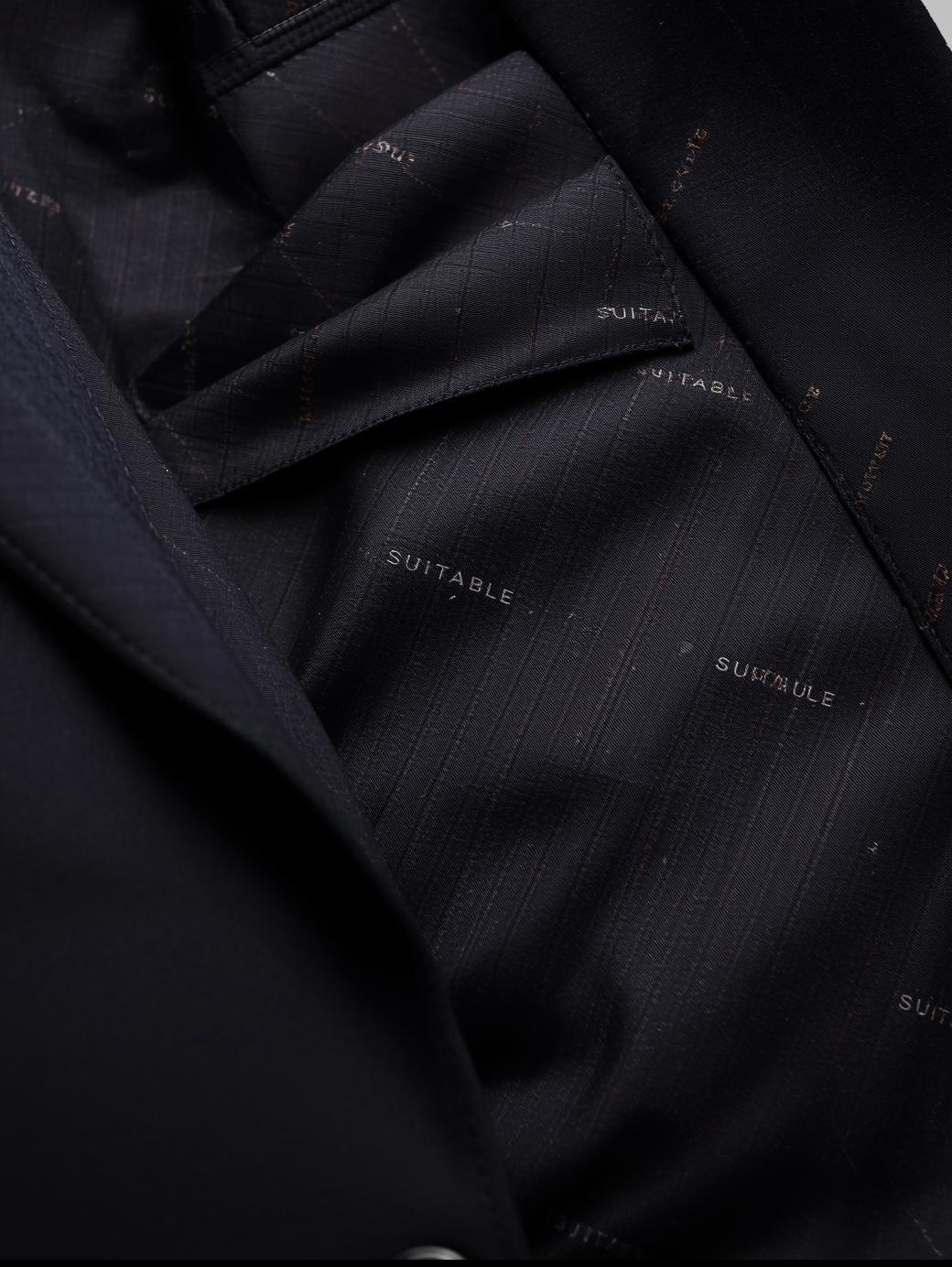 Signature Navy Blue Suit.