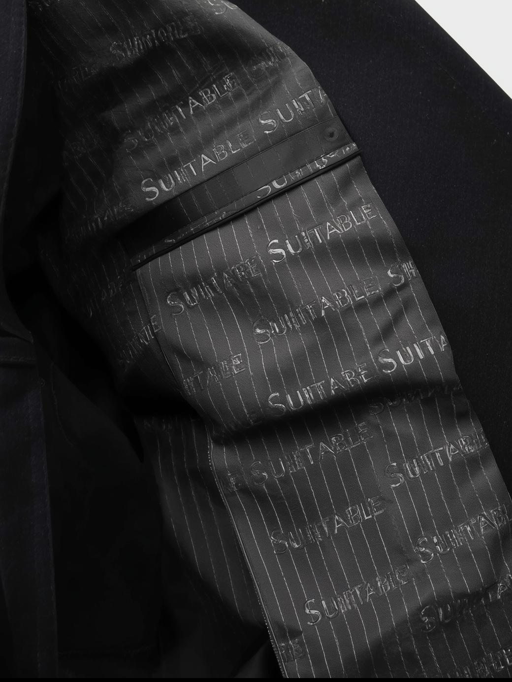 Signature Black Suit.