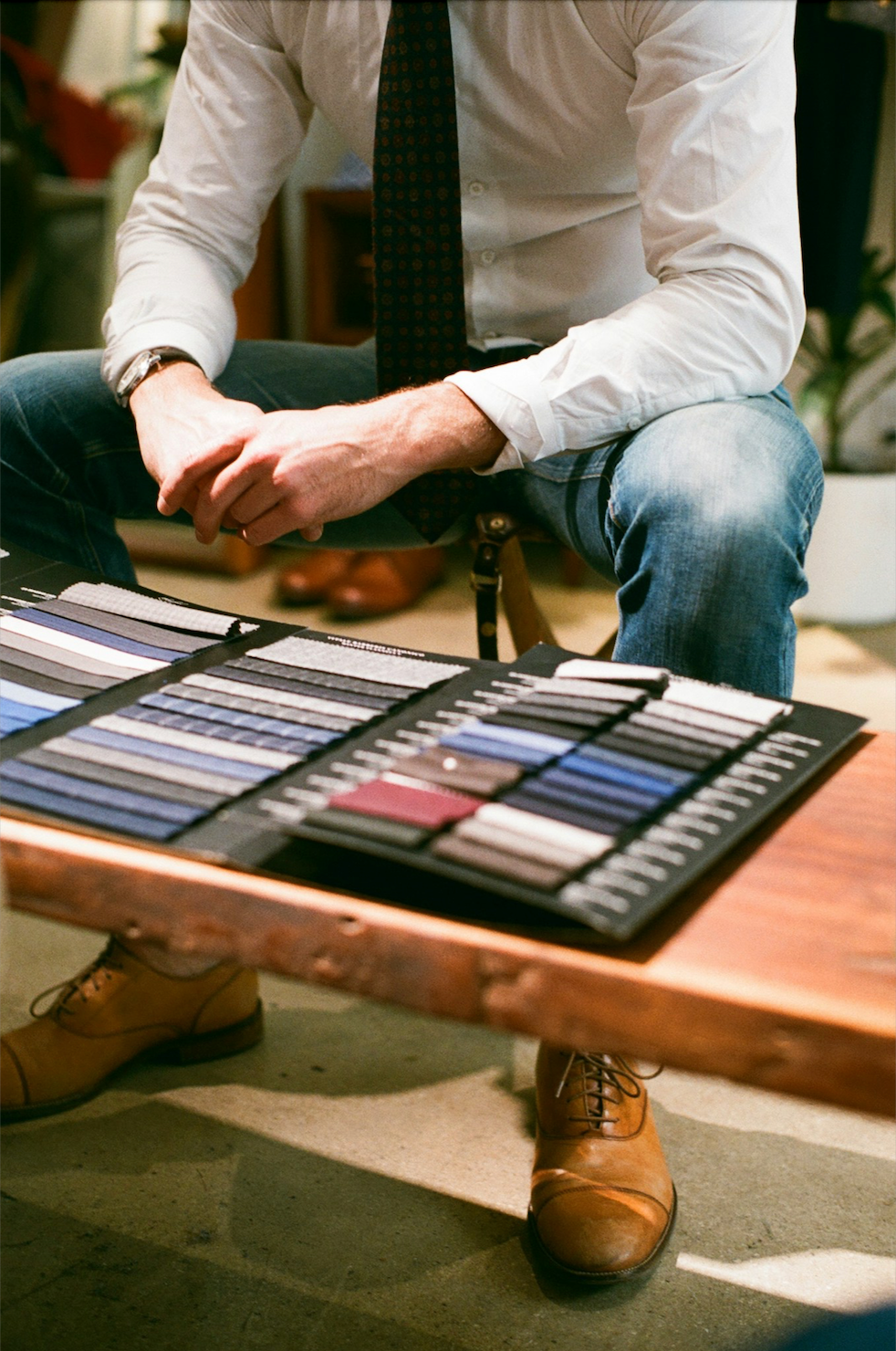 Over 500 custom suit fabric options including wool, linen, and cotton.